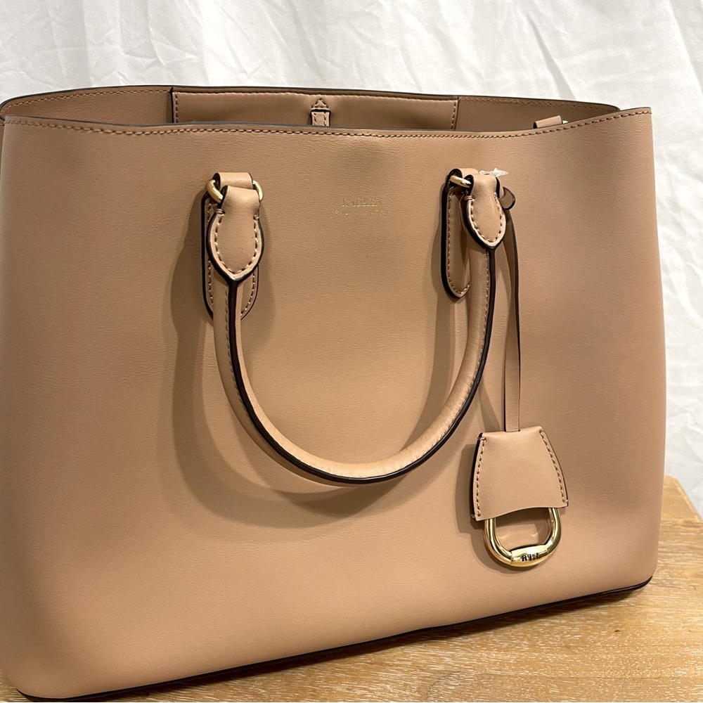 Ralph Lauren women’s cream leather bag. Comes with strap. Brand new.